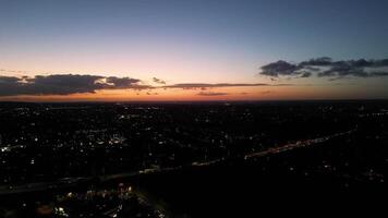 Most Beautiful Low Angle Footage of Illuminated Luton City of England UK at Just After Sunset and Full Moon Night. Footage Was Captured with Drone's Camera on October 17th, 2024 video