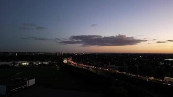 Most Beautiful Low Angle Footage of Illuminated Luton City of England UK at Just After Sunset and Full Moon Night. Footage Was Captured with Drone's Camera on October 17th, 2024 video