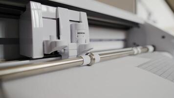 The process of cutting paper with a cnc plotter. The cnc machine automatically cuts shapes from paper with a built-in knife video