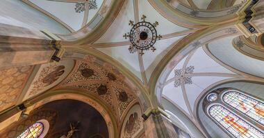 loop rotation in interior view dome and looking up into old catholic church ceiling with fresco video