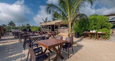 360 hdri panorama with coconut trees on ocean coast near tropical shack or open cafe on beach with swing video