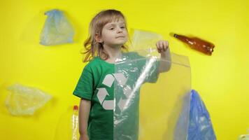 Girl activist with cellophane and paper packages. Reduce plastic pollution. Save ecology environment video