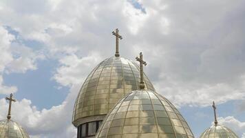 Dome of the church, aerial view, traditional old church in Lviv, Ukraine city, cloudy sky background video