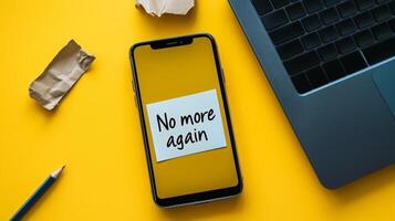 Smartphone with a discouraging message against modern internet traps on the screen, surrounded by everyday office tools. 'No More Again' written, concept of technology detox. photo