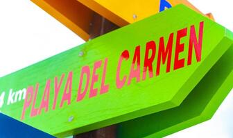 Playa del Carmen Quintana Roo Mexico 2023 Colorful direction signs to many places in Mexico. photo