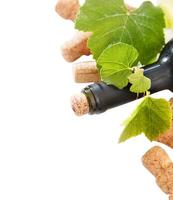 Dated wine bottle corks and bottle photo