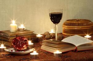 Still life with pomegranrte and wine photo