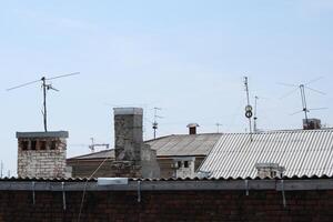 a view of a building with a lot of antennas on it photo