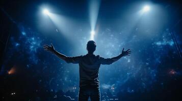 Silhouetted performer with arms wide open in galaxy of stage lights image. Entertainment event photography scene wallpaper. Sense of vastness and wonder concept photorealistic photo