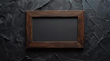 Rustic wooden frame mockup placed on textured black wall. Dramatic moody aesthetic photoframe template advertising image. Contemporary design pictureframe mock up product photorealistic photo