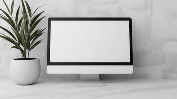 Exotic plant in pot and computer display mockup. Modern office decor with pc monitor template advertising image. Employee workplace digital screen mock up product photorealistic photo