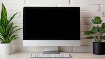 Mockup monitor of computer with potted plants near brick wall. Corporate office device with blank screen template advertising image. Workplace screen mock up product photorealistic photo