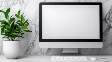 Computer monitor mockup with houseplant near marble wall. Minimalist workplace with pc display template advertising image. Office electronics mock up screen product photorealistic photo