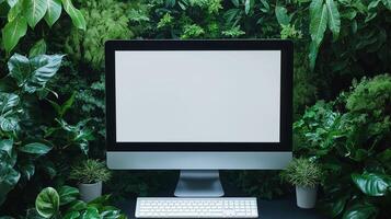 Mockup pc display among fresh tropical plants. Sustainable computer technology protecting nature template advertising image. Equipment screen mock up product photorealistic photo