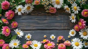 Flowers wreath on old wooden frame banner background copy space. Windflowers frame on board desk image backdrop empty. Spring nature concept composition top view, copyspace photo