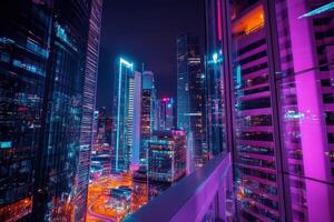 Vibrant city skyline illuminated with neon lights at night from a high-rise building balcony photo