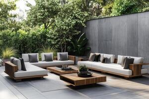 Modern outdoor lounge area with stylish seating and greenery at a contemporary residence photo