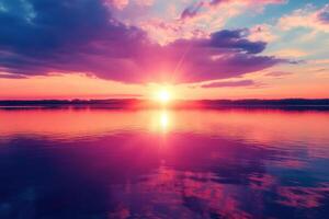 Vibrant sunset over calm lake reflecting stunning colors and clouds at dusk photo