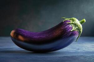Close-up of a glossy, ripe eggplant on a dark surface in natural light showcasing its vibrant color photo