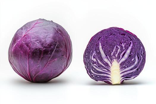 Whole and sliced fresh red cabbage showcases vibrant color and texture on a clean backdrop photo