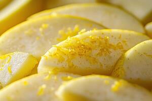 Fresh apple slices with lemon zest brighten a summer kitchen fruit display photo