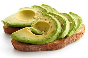 Delicious avocado toast with fresh slices served on toasted whole grain bread photo