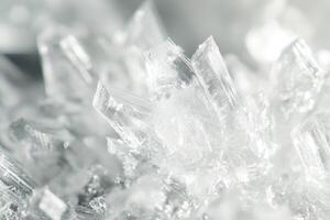 Delicate ice crystals sparkle under natural light during a winter morning in a frozen landscape photo