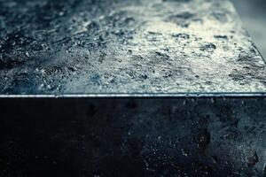 Close-up view of textured dark surface showcasing intricate details and shine in studio light photo