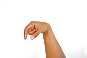 Deaf alphabet letter Q by hand. Letter 'Q' in sign language, isolated on a white background. Hand gestures. languages that use visual manual modality. Deaf Sign. photo