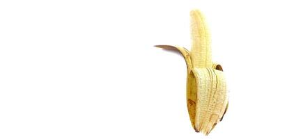Banana isolated. Ripe peeled banana on a white background with copy space photo