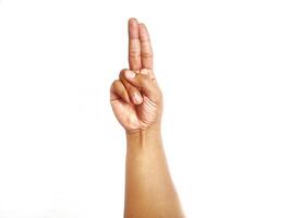 Deaf alphabet letter U by hand. Letter 'U' in sign language, isolated on a white background. Hand gestures. languages that use visual manual modality. Deaf Sign. photo