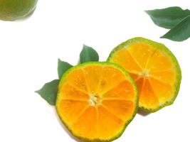 Lemon isolated. 2 Round slice of ripe lemon with leaves on a white background. Fresh fruits. photo