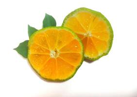 Lemon isolated. 2 Round slice of ripe lemon with leaves on a white background. Fresh fruits. photo