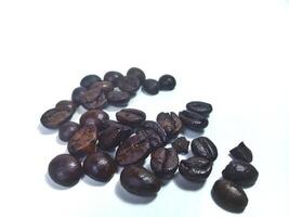 Roasted coffee bean isolated on white background with copy space photo