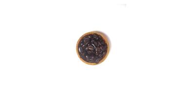 Roasted coffee bean on wood bowl isolated on white background with copy space photo