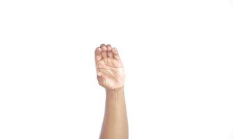 Hand holding an invisible object, isolated on white. Asian male hand in a gesture of giving or grabbing, perfect for concepts of interaction and communication. Close up view photo