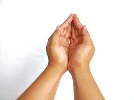 Religion. Man with open palms praying on white background, closeup photo