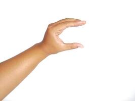Hand holding an invisible object, isolated on white. Asian male hand in a gesture of giving or grabbing, perfect for concepts of interaction and communication. Close up view photo