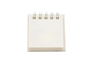 Blank desk calendar with Clipping path isolated on white background. Calendar concept with copy space for text or infographic. photo