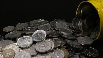 Stack of Indonesian coins isolated photo