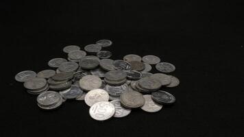 Stack of Indonesian coins isolated photo