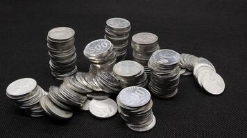 Stack of Indonesian coins isolated photo