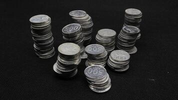 Stack of Indonesian coins isolated photo