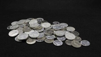 Stack of Indonesian coins isolated photo
