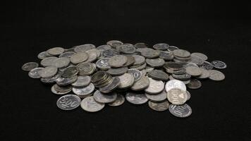 Stack of Indonesian coins isolated photo