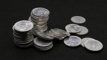 Stack of Indonesian coins isolated photo