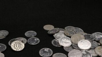 Stack of Indonesian coins isolated photo