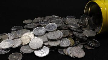 Stack of Indonesian coins isolated photo