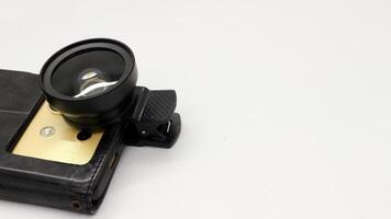 Attachable camera lens on smart phone photo