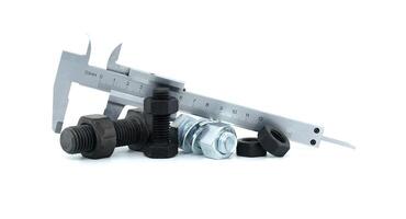 Caliper measuring bolts and nuts for precision engineering and mechanical projects photo